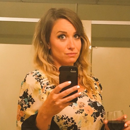 Caroline Renfro taking a mirror selfies.